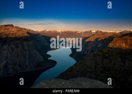 looking into deep and narrow norway fjords Stock Photo