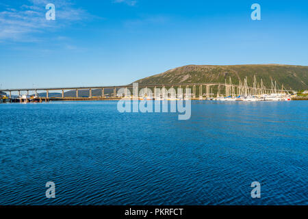 View of Tromso Bridge across Tromsoysundet strait in Norway. It connects Tromso on island of Tromsoya with Tromsdalen on mainland