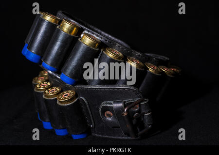 Hunting ammunition in leather bandolier . Stock Photo