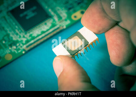 Silicon ceramic chip in the hand Stock Photo