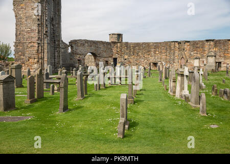 Ruin and graveyard with tombstones near St Andrews cathedral, Scotland Stock Photo