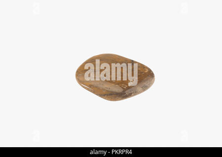 Tiger eye stone isolated. Macro shooting Stock Photo