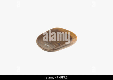 Tiger eye stone isolated. Macro shooting Stock Photo