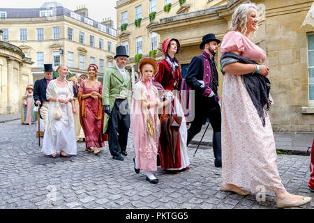 Bath, UK. 15th Sep, 2018. Jane Austen fans are pictured taking part in the world famous Grand Regency Costumed Promenade. The Promenade, part of the Jane Austen Festival is a procession through the streets of Bath and the participants who come from all over the world dress in 18th Century costume. Credit:  Lynchpics/Alamy Live News Stock Photo