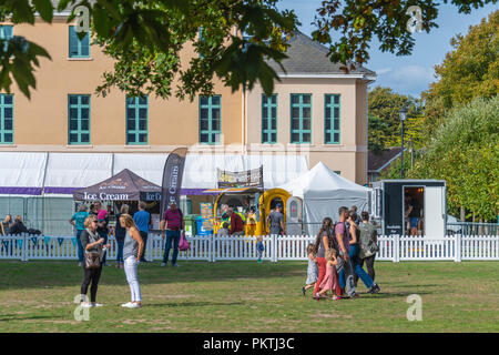 Bournemouth, UK. 15th September 2018. People of all ages exploring the numerous art installations as part of the InsideOutDorset arts festival in Bournemouth including auto/visual pieces on the cliff top, sun loungers in the shade that speak stories and experiencing life as a bird. The festival goes on until 22nd September 2018. Credit: Thomas Faull/Alamy Live News Stock Photo