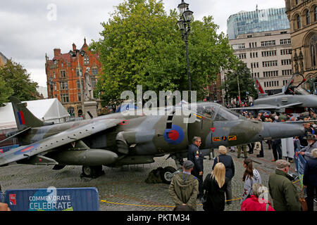 Manchester, UK. 15th Sep 2018. Harrier pilot and Squadron Leader Bob Iveson who had to eject from his plane and landed behind enemy lines in the Falkland Islands joins  the Royal Air Force at 100, aircraft tour.  Also on display in the city square are the Snipe Biplane, Spitfire, Typhoon replica and a Lancaster front fuselage.  Albert Square, Manchester , 15th September, 2018 (C)Barbara Cook/Alamy Live News Stock Photo