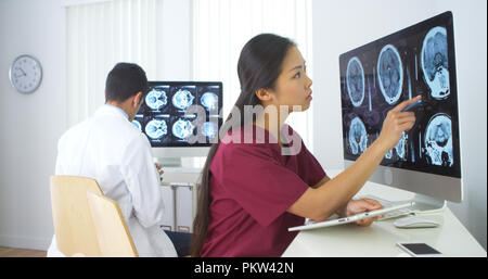Multi-ethnic medical team working in the office Stock Photo
