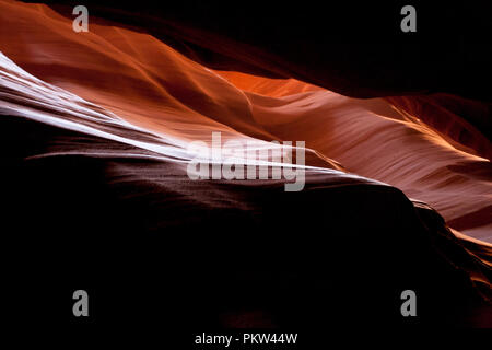 Light Shining Through Washed Rock Formations in Antelope Canyon Stock Photo