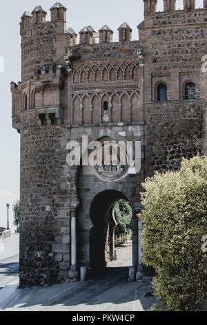 Medieval city gate Puerta del Sol in Toledo, Spain Stock Photo