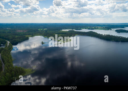 Finland Punkaharju, with lakes glistening between the grand pine trees growing on both sides of the ridge, is the best known national scenery and stro Stock Photo