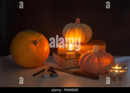 family fun activity - carved pumpkins into jack-o-lanterns for halloween close up Stock Photo