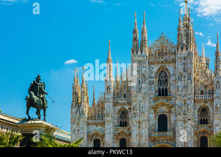 Milan Cathedral and Vittorio Emanuele II statue. Stock Photo