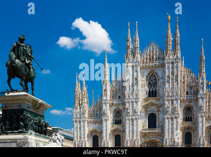 Milan Cathedral and Vittorio Emanuele II statue. Stock Photo