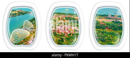 Porthole windows flying on Singapore bay. Scenic flight above gardens by the bay skyline. Night urban aerial scene with copy space on white background. Stock Photo