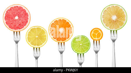 Isolated citrus slices. Pieces of grapefruits, lemon, orange, lime and kumquat on a dessert forks isolated on white background with clipping path Stock Photo