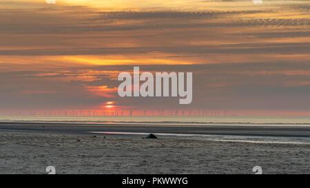 Sunset over Point Of Ayr beach, near Talacre, Flintshire, Wales, UK Stock Photo