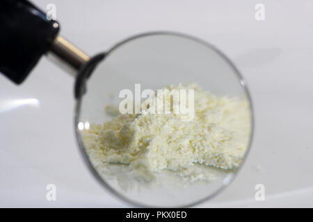 Chemical powder from the chemistry kit with macro lens photographed in studio Stock Photo