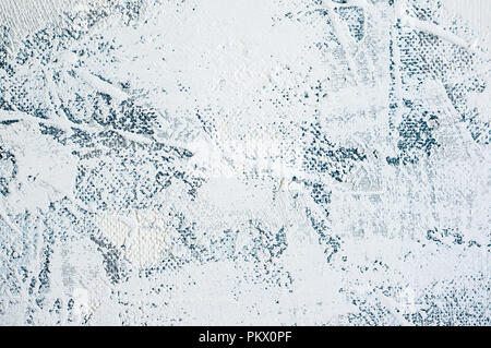 The original background of natural cement plaster on the blue textured wall with cracks. Stock Photo