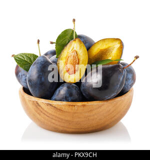 Cup full of ripe prunes. Fruits isolated on white background Stock Photo