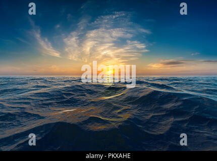 Sunset or sunrise over cold, choppy water Stock Photo