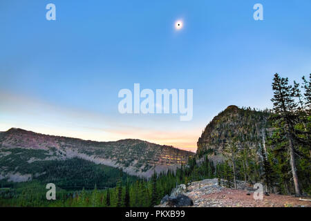 The sun turns into a black dot during a total solar eclipse on 8-21-17 in the Strawberry Mountains Wilderness, Oregon. Stock Photo