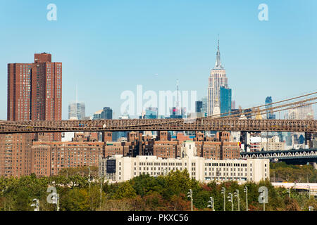 MANHATTAN - NEW YORK - USA - 30 OCTOBER 2017. Amazing view of the Manhattan skyline with the Empire State Building on background and the Brooklyn Brid Stock Photo