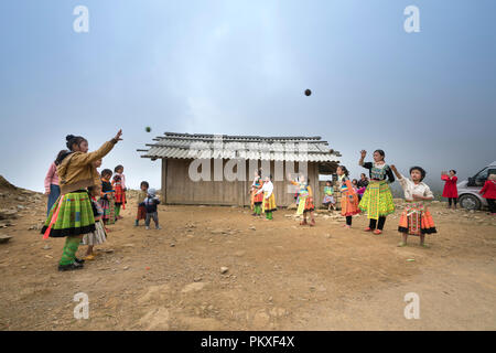 In time Hmong New Year at the end of the Lunar year, they often wear the most beautiful costumes, Stock Photo