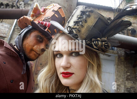 Kiev, Ukraine. 15th Sep, 2018. A couple wearing steampunk costumes is seen during ''VI KyivSteamCon'' event in Kiev.The Steampunk festival involving workshops, talks, competitions, dances and lectures attracts fans of subgenre steampunk, cosplay and science fiction. Credit: Pavlo Gonchar/SOPA Images/ZUMA Wire/Alamy Live News Stock Photo