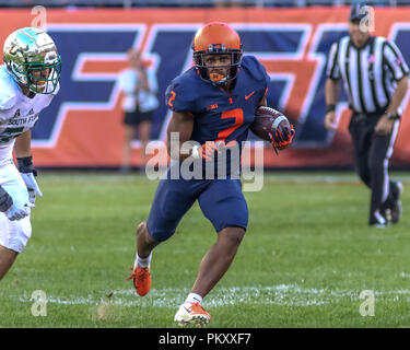 Chicago, USA. 15th September 2018. Illinois Fighting Illini running back Reggie Corbin (2) eludes the USF defense during NCAA football game action between the University of Illinois Fighting Illini vs the University of South Florida Bulls at Soldier Field in Chicago, IL Credit: Cal Sport Media/Alamy Live News Stock Photo