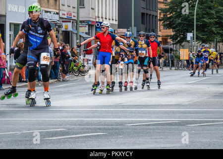 Berlin Germany, 15 September 2018. Annual Inline Skating Marathon. In line skaters pass through Rosenthaler Platz as they compete in the annual roller skating event. The event is the Grand Finale of the Inline skating season as skaters participants from 60 countries compete for the WORLD and GERMAN INLINE CUP Credit: Eden Breitz/Alamy Live News Stock Photo