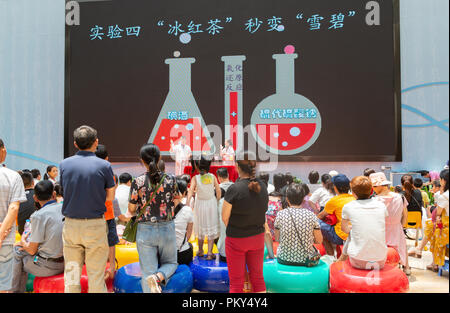 Guangzhou,China-August 4,2018:People attending a science experiment show at Guangdong Science Center. Stock Photo