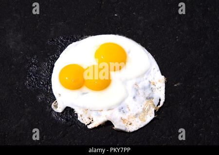 Eggs in carton with some broken.  Some images eggs frying on hot asphalt, concept. Stock Photo