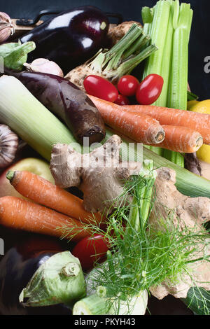Local fresh raw vegetables in wooden box Stock Photo