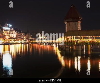 Night view of beautiful Chapel Bridge in Lucerne Lake, Night view of Lake Lucerne Stock Photo