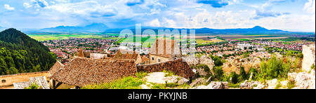 Rasnov, Romania: Panoramic view of the city as seen from the walls of the citadel. Stock Photo