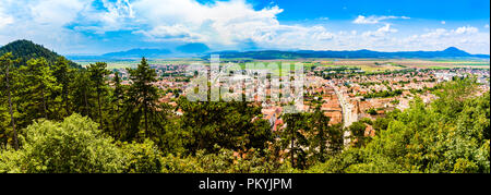 Rasnov, Romania: Panoramic view of the city as seen from the walls of the citadel. Stock Photo