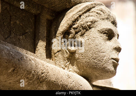 Stone portrait on external frieze on St Jakov's cathedral in Sibenik made  in the 15th century. The cathedral is UNESCO world heritage site Stock Photo