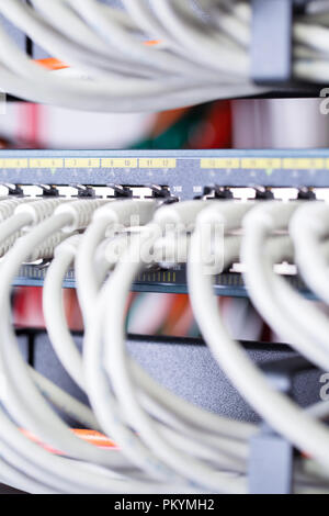 Close-up of gigabit network switch and cables in datacenter Stock Photo