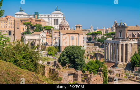 Scenic sight in the Roman Forum, with the Campidoglio Hill, the Vittoriano monument and the Settimio Severo Arch. Stock Photo