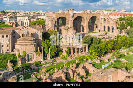 The Basilica of Maxentius and the Temple of Romulus in the roman forum. Rome, Italy. Stock Photo