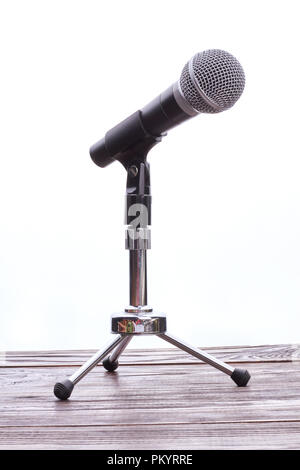 Grey mini microphone on stand. Stock Photo