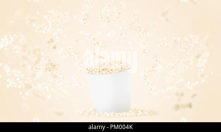 Blank white food bucket with popcorn mockup on yellow background, depth of field effect, 3d rendering. Empty pail with falling pop corn mock up. Paper fastfood box template, isolated. Stock Photo