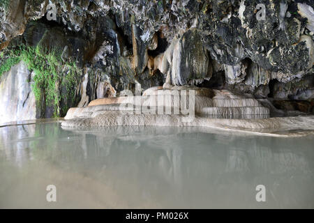 Armenia, rock formations in the cave with natural hot water, under 'Devils Bridge' near Tatev Stock Photo