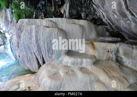 Armenia, rock formations in the cave with natural hot water, under 'Devils Bridge' near Tatev Stock Photo