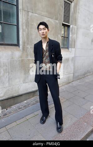 Artist and model Sang Woo Kim outside the BFC Show Space during London Fashion Week. Stock Photo