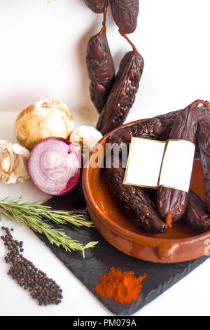 Blanck space tag in sausages for sale still life mediterranean chorizo spicy Stock Photo