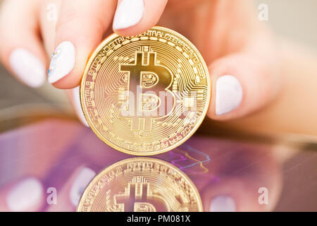Golden Bitcoins. New virtual money. Stock Photo