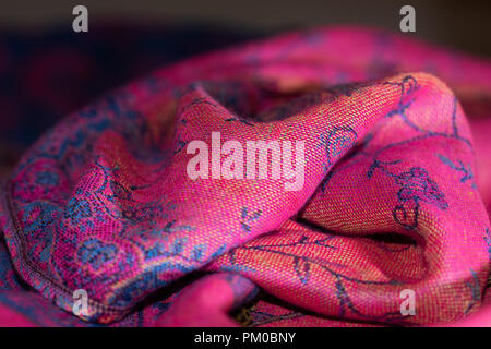 Pink and purple original cashmere fabric laying Stock Photo