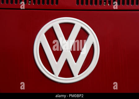 VW Badge on a Volkswagen Camper van. Emblem, logo. Brand. Iconic symbol Stock Photo