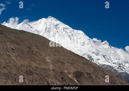 Karimabad, Hunza Valley, Gilgit-Baltistan, Pakistan : Rakaposhi mountain in the Karakoram range, at 7,788 m (25,551 ft) It is the 27th highest in the  Stock Photo